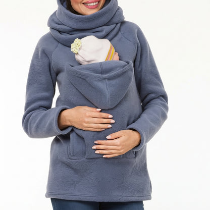 Kuscheliger Tragepulli mit Babytasche